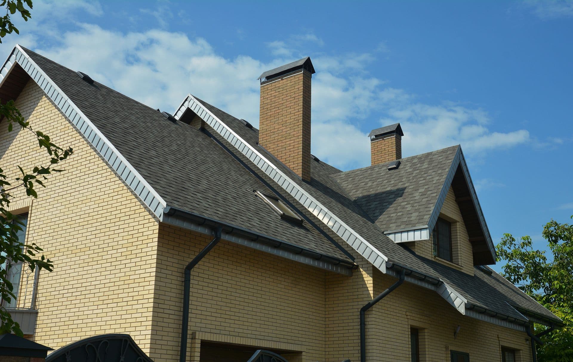 bigstock-An-Asphalt-Shingled-Roof-With--435755486 (1).jpg