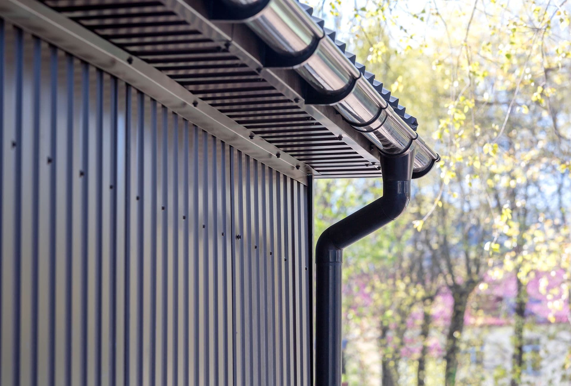 bigstock-Brown-Plastic-Downspout-125908187 (1).jpg